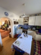 Küche Richtung Wohnzimmer - Idyllisches Einfamilienhaus mit Untersbergblick und Süd Ausrichtung