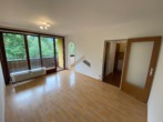 Wohnzimmer - Charmante 1,5-Zimmer-Wohnung mit Loggia und Blick ins Grüne
