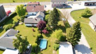 Grundstück hinten  - (KI überarbeitet) - Traditionelles Wohn- und Geschäftshaus mit Entwicklungspotenzial in Bad Mitterndorf